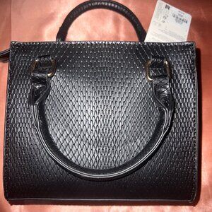 black textured handbag